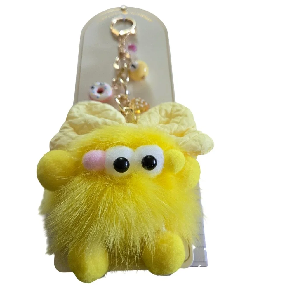 Eye Candy Los Angeles Monster Bag Charm Yellow New Fuzzy Plush Bow